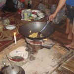 Thai Food: Cooking curry in a bamboo hut on top of a mountain