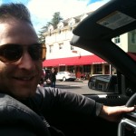 Tom driving in front of The Girl and the Fig Restaurant in Sonoma, California
