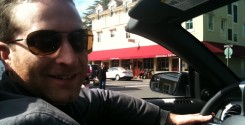 Tom driving in front of The Girl and the Fig Restaurant in Sonoma, California