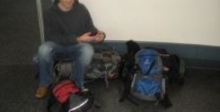 Tom guarding our bags while I go use the restroom.