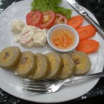 The evil shrimp. It is the white blob next to the weird roll concoction.