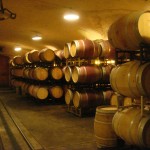 Stacks of wine barrels housing some of Napa's exquisite wine.