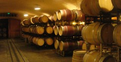Stacks of wine barrels housing some of Napa's exquisite wine.