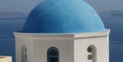 The blue dome of a church in Santorini, Greece.