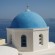 The blue dome of a church in Santorini, Greece.