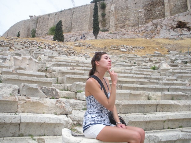 AthensThinking After trekking through Athens in the ancient footsteps of so many great and powerful thinkers, you may even find yourself a little wiser. Pondering life on what's left of the seats of the old Acropolis theater.