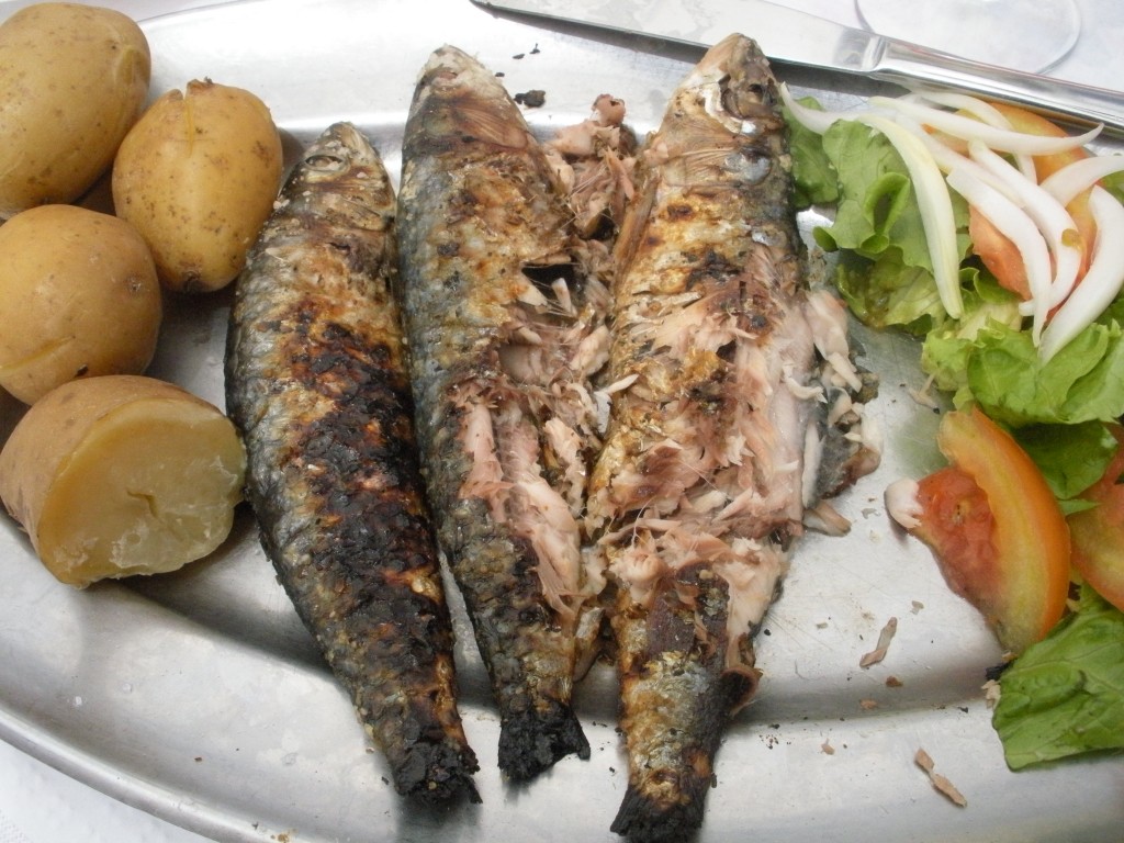 Mangled sardines in Lisbon, Portugal, after trying to figure out how to eat them.