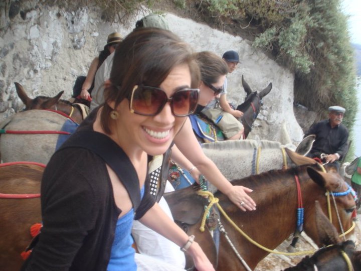 Riding a donkey in Santorini -- note the look on my face is excited but terrified.