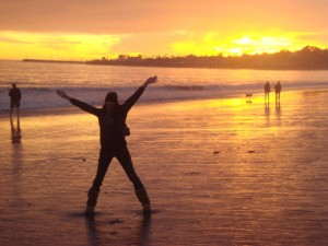 One Day in a City - On vacation in front of a stunning beach sunset