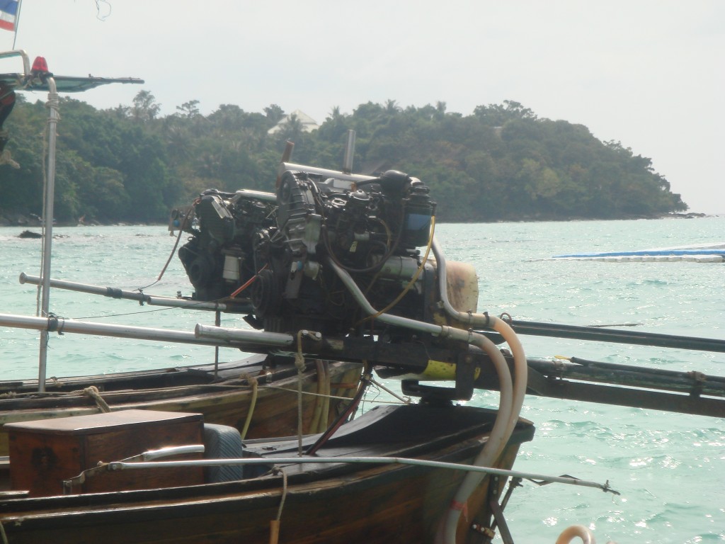 The crazy looking motor contraption on the longtail boat. 