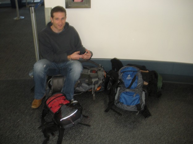 Tom guarding our bags while I go use the restroom.