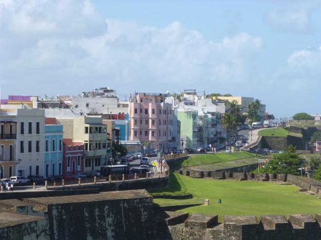 Castillo San Cristobal fort stretching out alongside the buildings of San Juan. 
