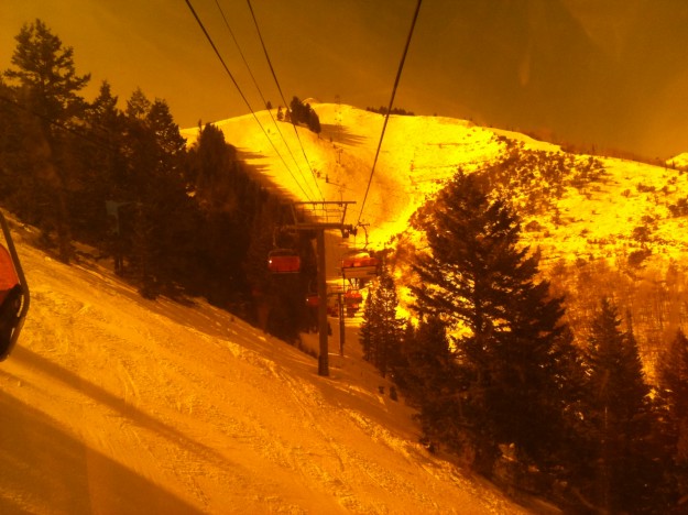 A hazy orange glow from the bubble heated chair lift at Canyons Ski Resort in Park City, Utah.