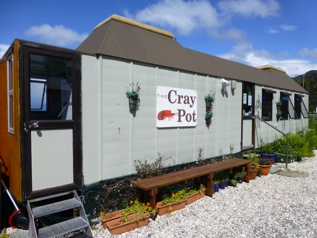 The kitchen entrance and, farther down, the main entrance to The Cray Pot.