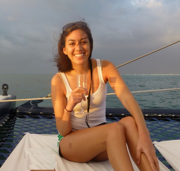 Relaxing onboard Zoetry's catamaran with a glass of champagne. 