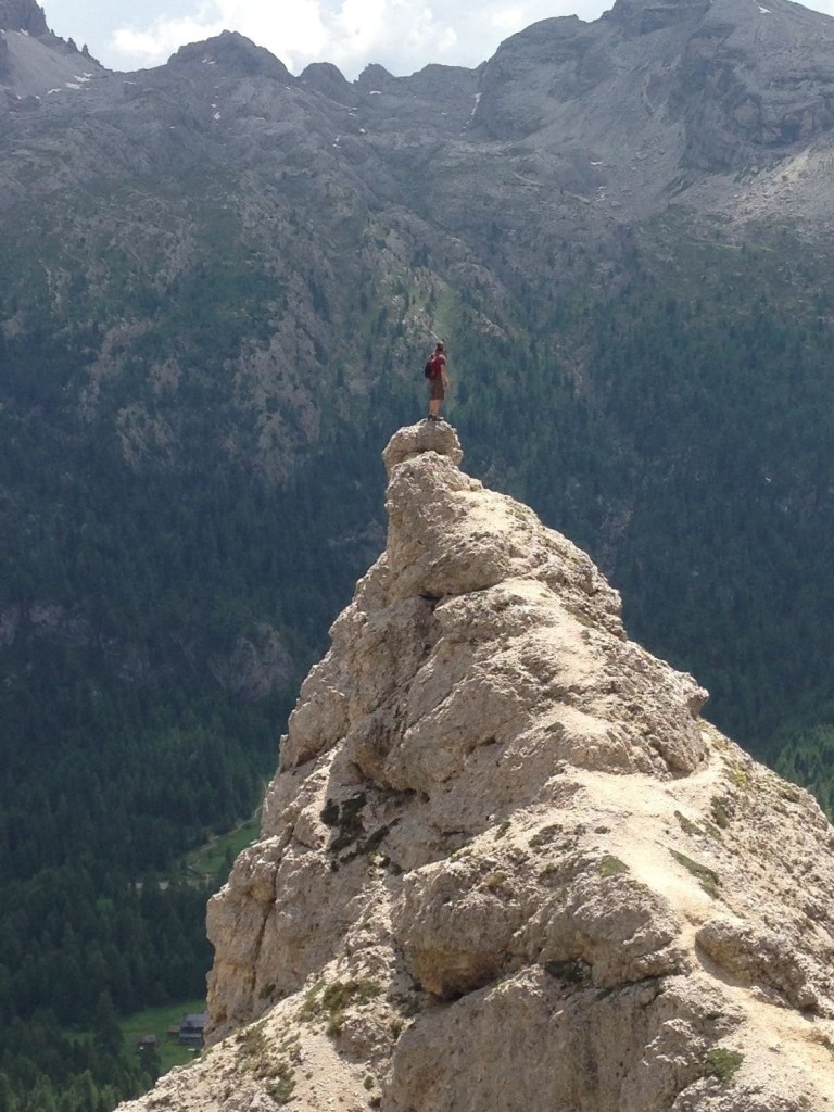 Standing on top of ridge in Dolomites.