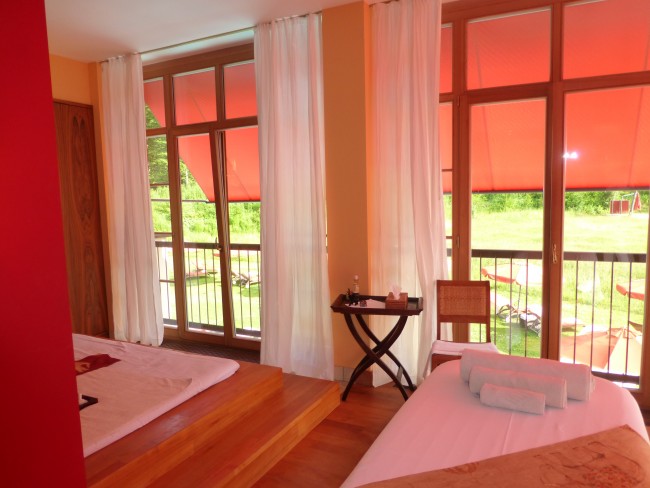The spa at Schloss Elmau includes different massage tables and platforms, including one for a Thai massage on the floor. 