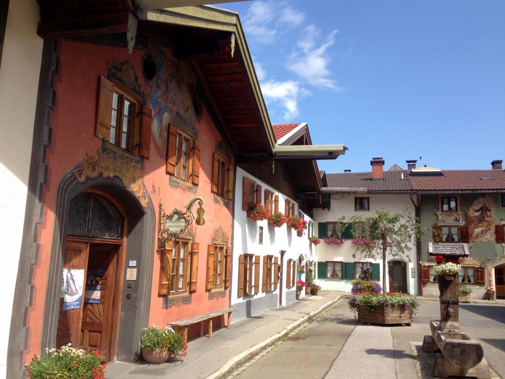 Geigenbaumuseum is the pretty salmon colored building on the right. 