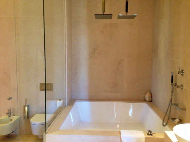 Buddha-Bar Hotel Bathroom: TWO shower heads? I'm sold. 