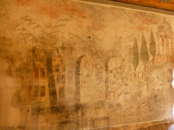 Original fresco artwork on the back wall of the stage.