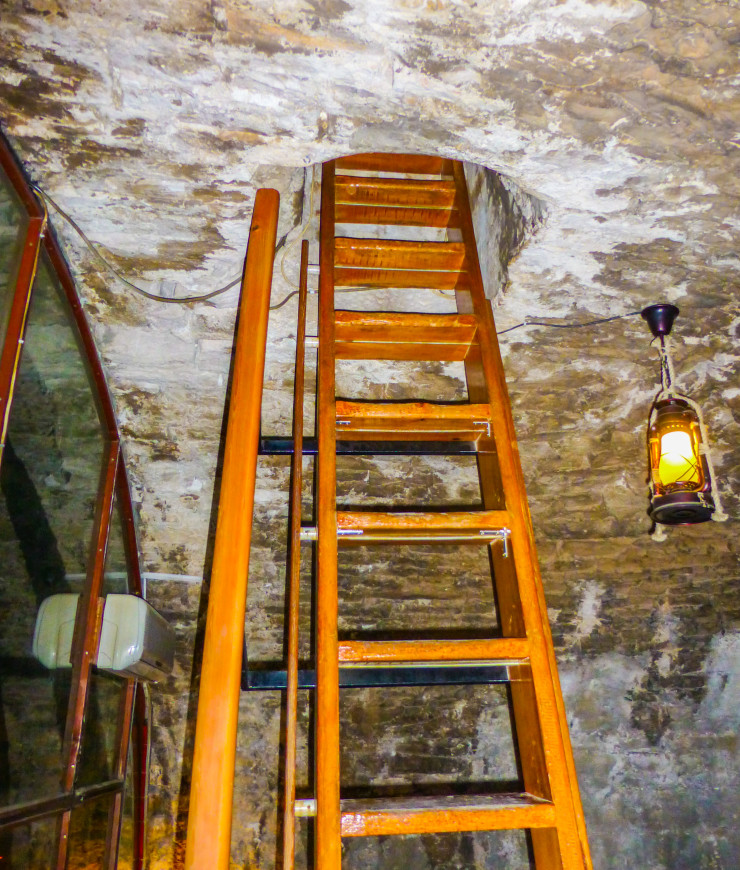 Ladder from the lower level to the upper level of Massimo Cocktail Bar. 