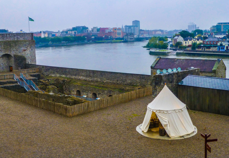 St. John Castle's courtyard with view of Limerick and River Shannon behind it. 