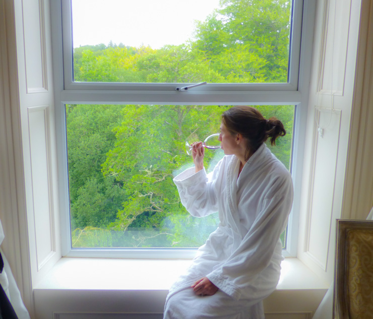 Enjoying that gorgeous Killarney view in the cozy bathrobe the hotel provides. 