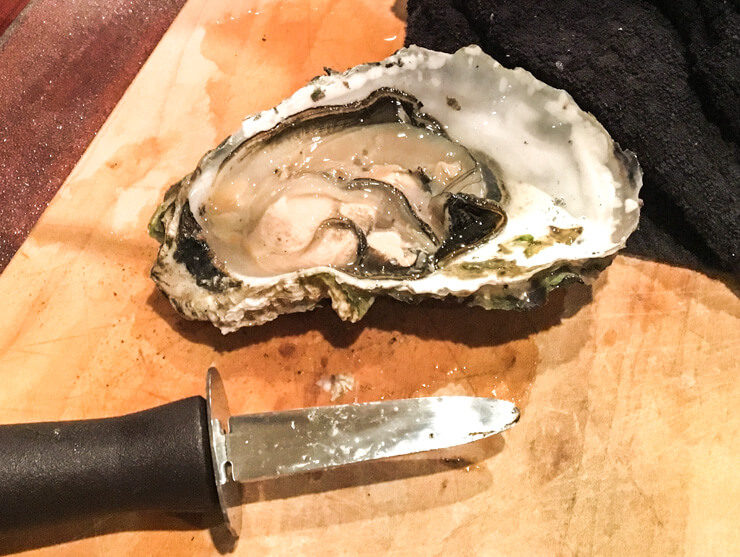 Trying an oyster is one of the top things to do in Rockaway Beach Oregon -- just make sure you have an oyster knife if you plan on doing it yourself.