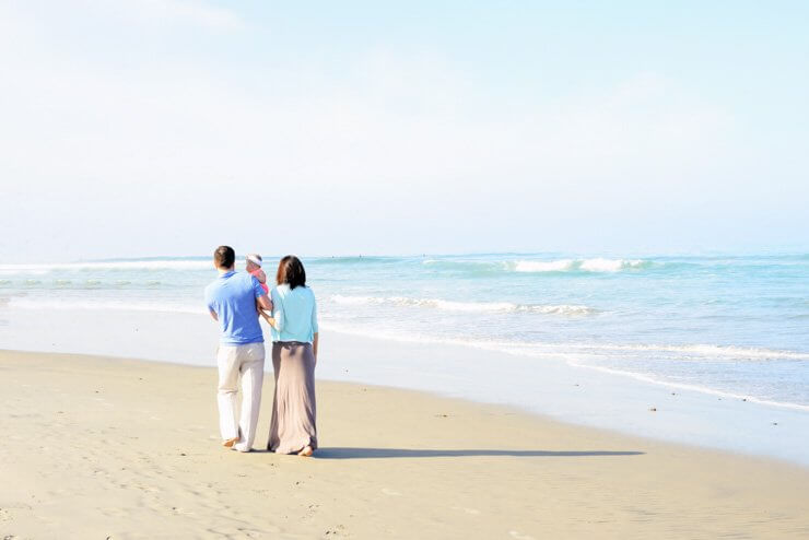 Walking along a San Diego beach. 