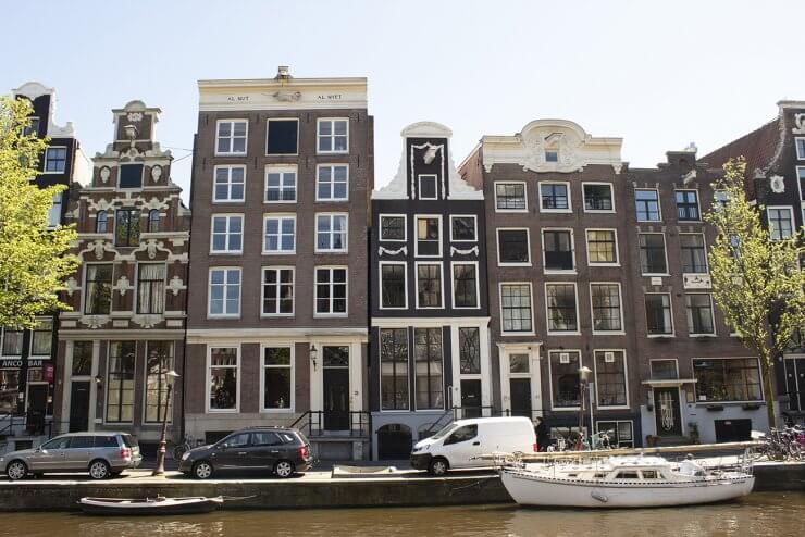 Houses by the canal in Amsterdam. 