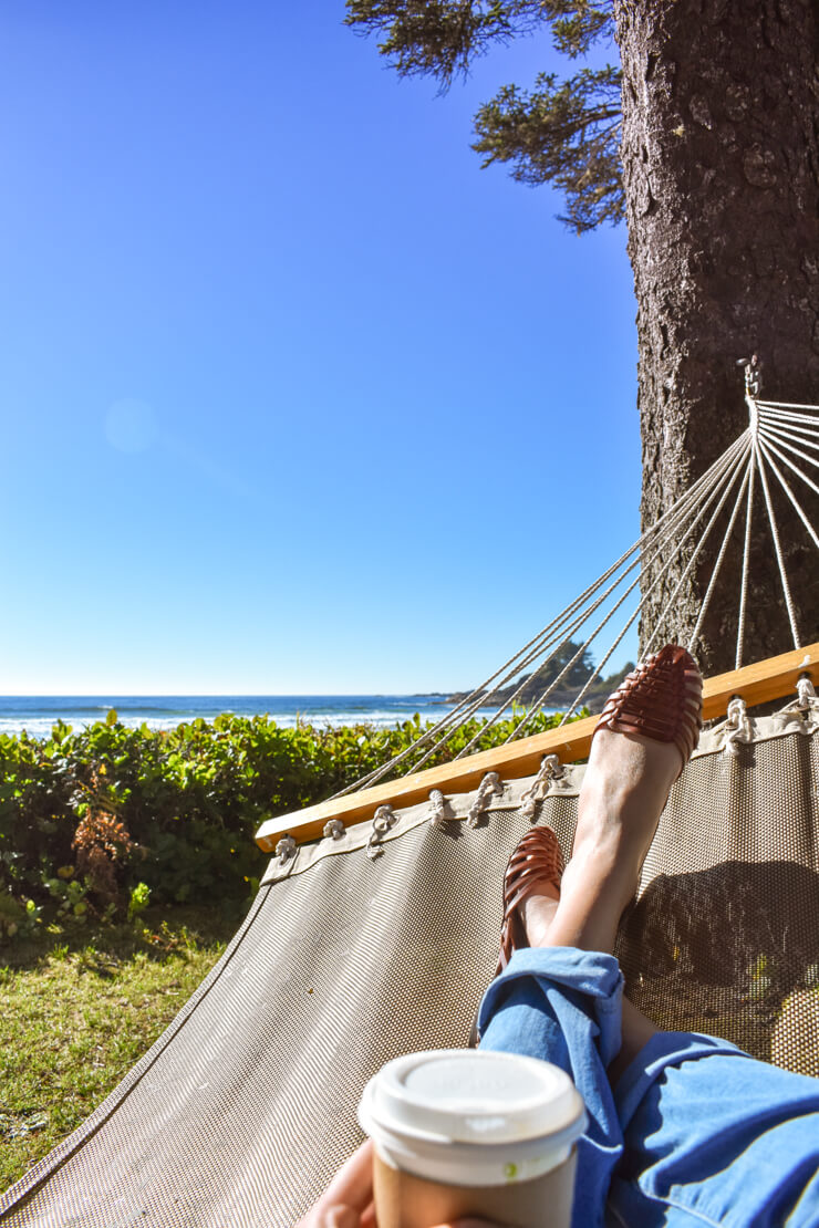 Relaxing in a hammock on the grounds of Pacific Sands Resort in Tofino