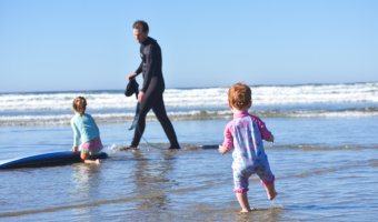 Surfing and playing in the ocean on Vancouver Island
