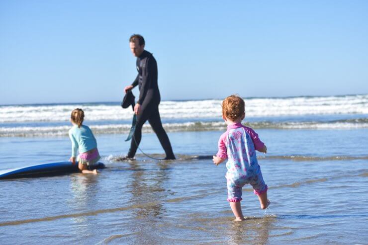 Surfing and playing in the ocean on Vancouver Island