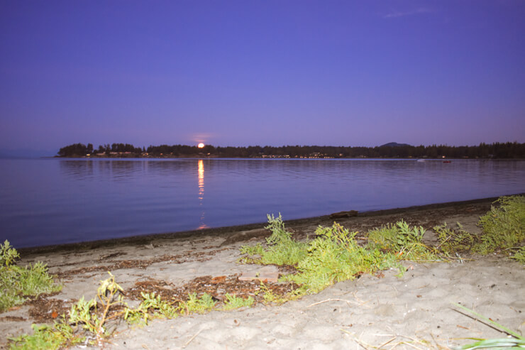 Beach in Parksville at dusk during High Tide. 