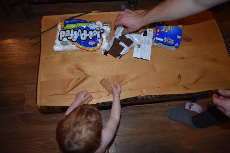 Ingredients for s'more and introducing our daughter to the art of making s'mores. 