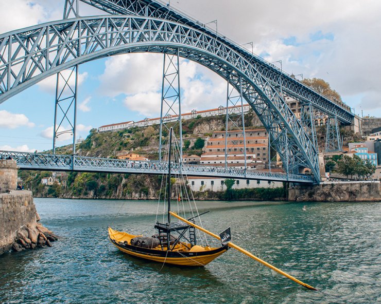 Yellow Rabelo Wine Boat under Dom Luis Bridge2