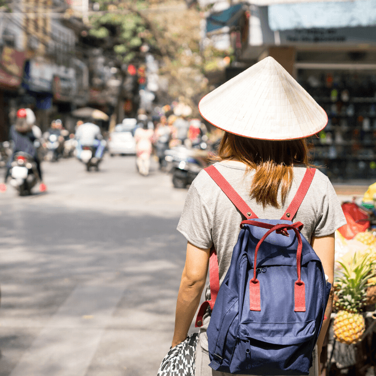 Traveler in Hanoi Old Quarter