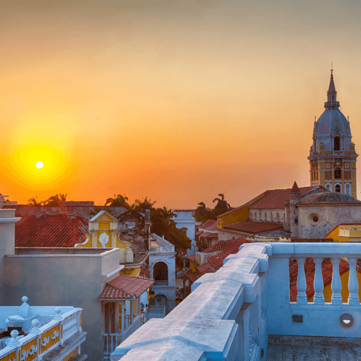 Sunset with a view of the Cartagena Cathedral and pretty rooftops and buildings of the city. 
