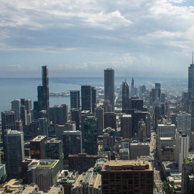 Skyscraper and water view from 360 Chicago. 