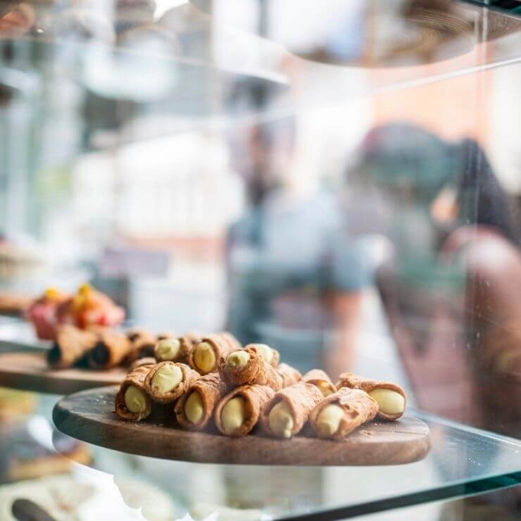 Yummy pastries seen through a window of a London Bakery.