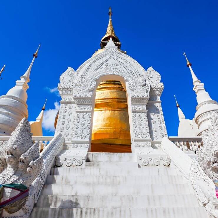 Wat Suan Dok is a beautiful white temple that is a great addition to your Chiang Mai itinerary when traveling. 