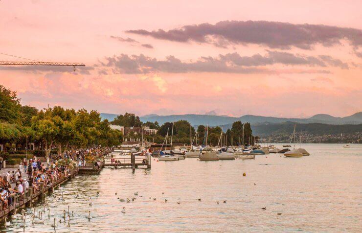 Beautiful pink sky over Lake Zurich at sunset. 