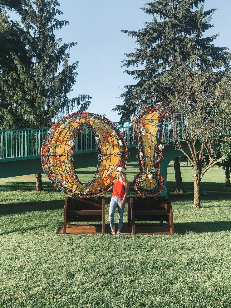 Sculpture in Omaha, Nebraska of a colorful O with an exclamation mark.