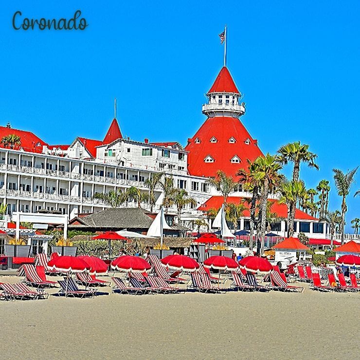 The red roofs and white facade of the Hotel del Coronado right by the beach. It's a perfect resort option for where to stay during a girls weekend in San Diego.