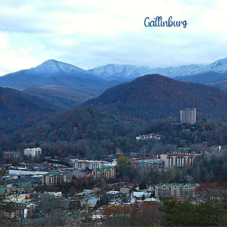 Gatlinburg with snow on the mountain peaks. 