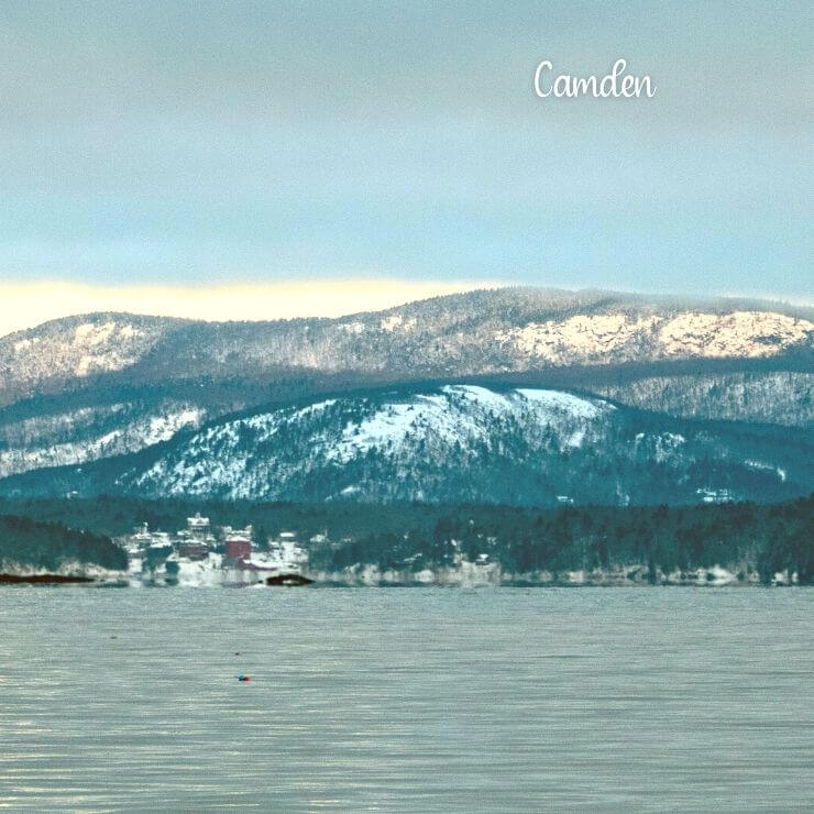 Take a New England winter trip to snowcapped mountains and ski runs in Camden, Maine. 