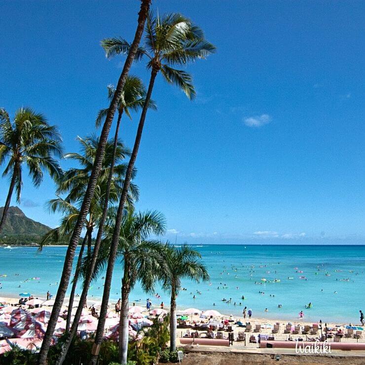 Enjoy beach time by big city sights with a girls getaway to Waikiki Beach near Honolulu, Hawaii. 