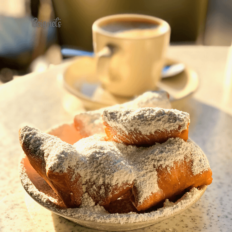 Beignets are a must try food a weekend getaway to New Orleans. 